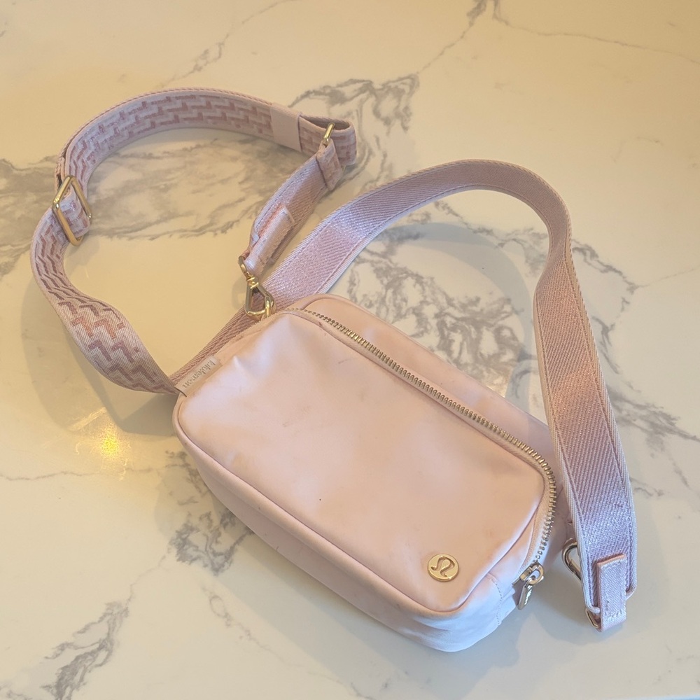 lululemon athletica Pale Pink Crossbody Belt Bag with Gold Accent